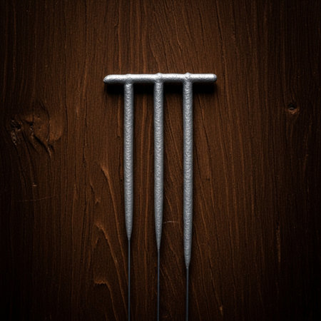 Metal nails on a wooden background. Selective focus. Toned.の素材