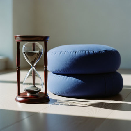Hourglass and blue pillow on the floor. Concept of time managementの素材