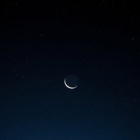 Crescent moon in the night starry sky. Space background.の素材