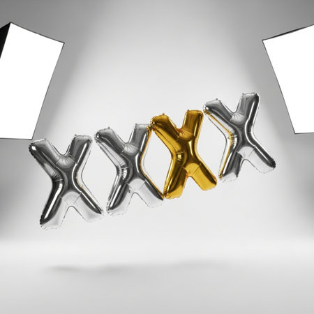 3d render of metallic alphabet balloons on white background. Letter Xの素材