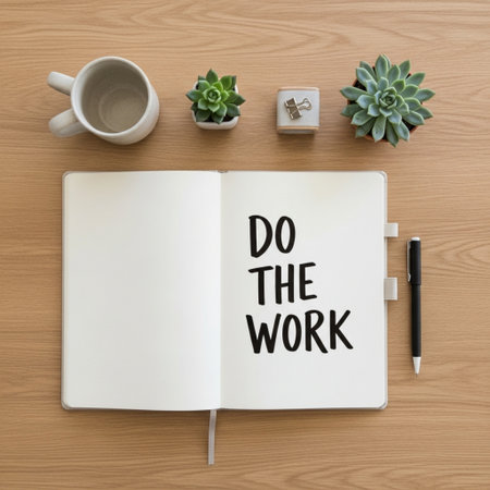 Do The Work text on notebook with coffee cup and succulent on wood backgroundの素材
