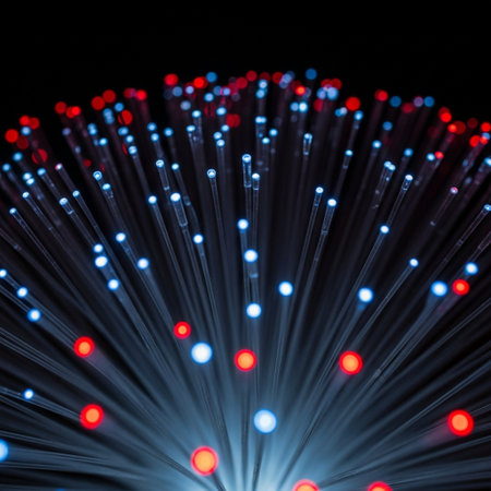 fiber optical network cable close up with red and blue light spotsの素材