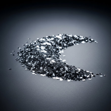Silver glitter on a dark background. Shallow depth of field. Toned.の素材