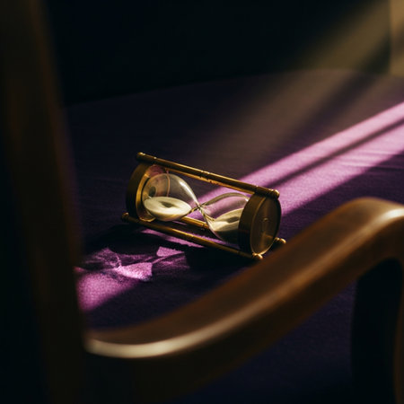 Hourglass on a purple chair in the rays of the setting sunの素材