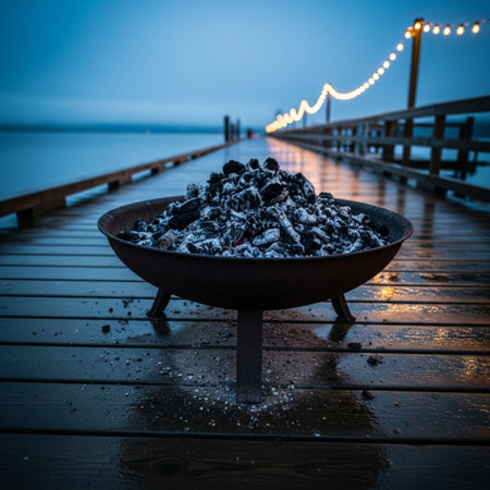 A black bowl filled with ice on a wooden pier at night.の素材