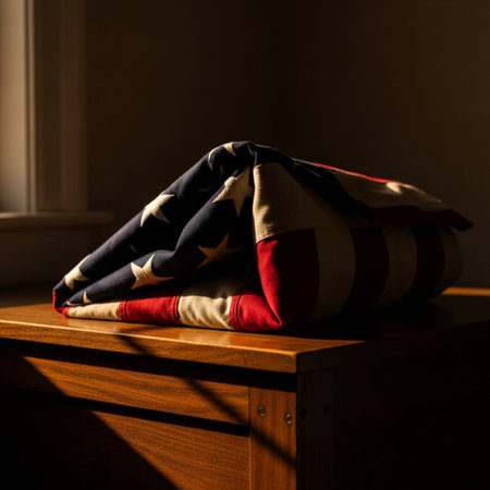 Pillows and American flag on a wooden chest of drawersの素材