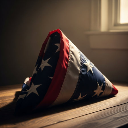 American flag on a wooden table in a room with a window.の素材