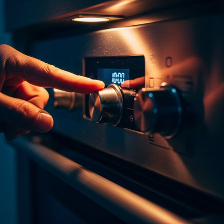Close-up of a hand pressing the button on the oven.の素材