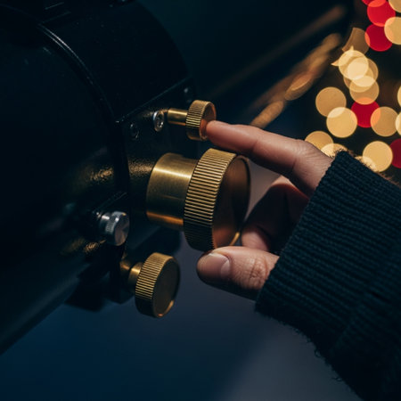 Close-up of a man's hand turning on the back of an old coffee machineの素材