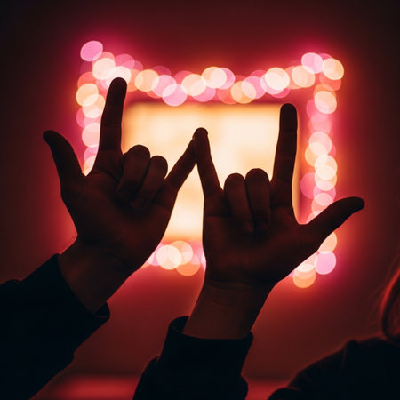 Hands of a young man and a woman on the background of a glowing Christmas treeの素材