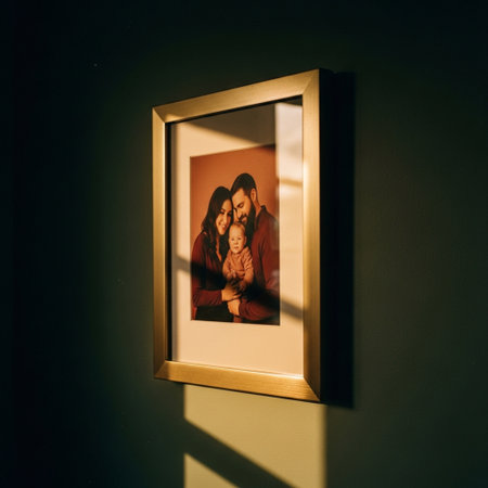Photo of a mother with her baby in a photo frame on the wallの素材