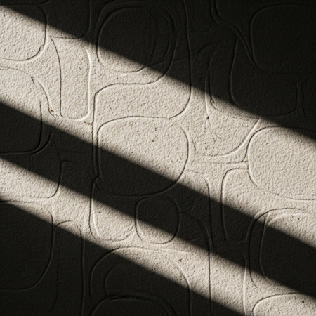 Close-up, cinematic shot of vintage textured wallpaper with subtle abstract rounded shapes and harshの素材