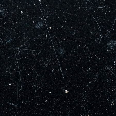 Wooden figures in a glass jar on a black background with water dropsの素材