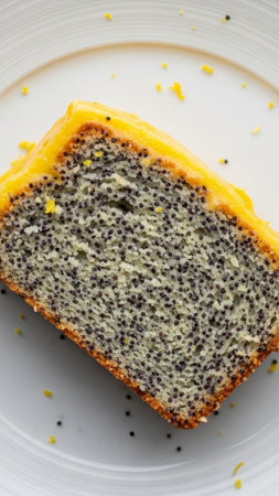Poppy seed cake on a white plate. Selective focus.の素材