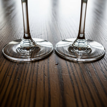 Hero detail shot of the intersection between two empty wine glass bases and the heavily textured, scの素材