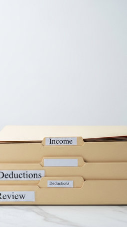 A vertical, tall 9:16 composition showcasing three labeled file folders centered on a clean surface.の素材