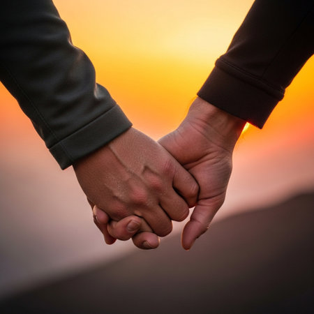 A square, tightly cropped, photorealistic image focused solely on the hands of a heterosexual coupleの素材