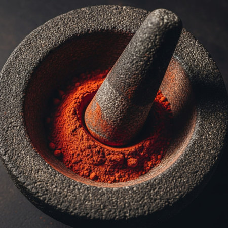 A deeply intimate, square-format photograph capturing the moment of creation. The focus is an extremの素材