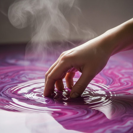 A tight, intimate square crop focusing entirely on a person's hand submerged in a bathtub. The focusの素材