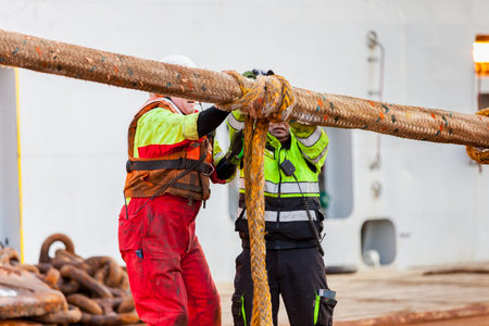 NORTH SEA, NORWAY - 2015 JANUARY 19. Anchor handling operation. Connect surface buoy to the...