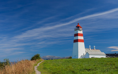 ALNES, NORWAY - 2015 August. Lighthouse Alnes on a hot summer day in Norwayのeditorial素材