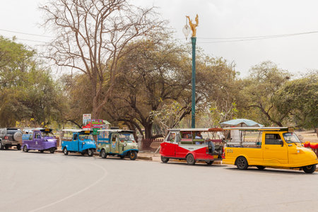 AYUTTHAYA, THAILAND - 2015 February. Colorful Tuk Tuk taxi in the street.
