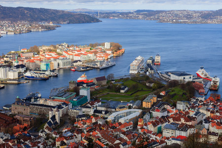 BERGEN NORWAY - 2016 MAY 01. View over city of Bergen in Norway with cruise vessels and offshore vessels in the harbour.のeditorial素材