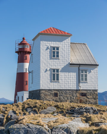 GRASOYANE LIGHTHOUSE, NORWAY - 2019 15th April. Grasoyane Lighthouse with blue skye at Ulsteinvik.のeditorial素材