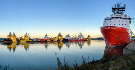 MONTROSE, SCOTLAND - 2016 OCTOBER 09. Eleven anchorhandler vessels inside Montrose Harbour at same...