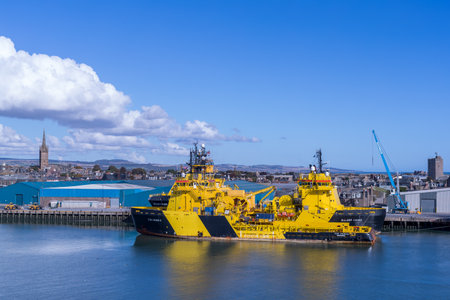 MONTROSE, SCOTLAND - 2016 OCTOBER 09. Yellow and black offshore vessels Tor Viking, Brage Viking and Balder Viking moored inside Montrose Harbour.のeditorial素材