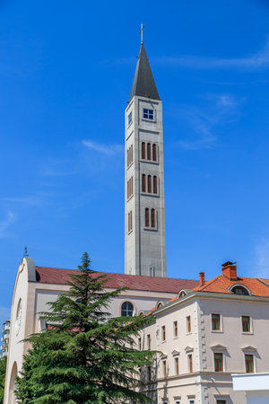 MOSTAR, BOSNIA HERZEGOVINA - 2017 AUGUST 16. The 107-meter-high Mustal Peace Clock Tower in Mostar City.のeditorial素材
