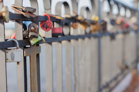 MURMANSK RUSSIA - 2014 SEPTEMBER 14. Love locks is typically the sweethearts names or initials inscribed on the padlock, and the key is thrown away.のeditorial素材