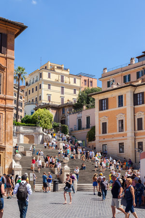 ROME, ITALY - 2014 AUGUST 17. A lot of people are on the Spanish Steps near church Santissima TrinitÃ  dei Monti and Obelisk Sallustiano.のeditorial素材