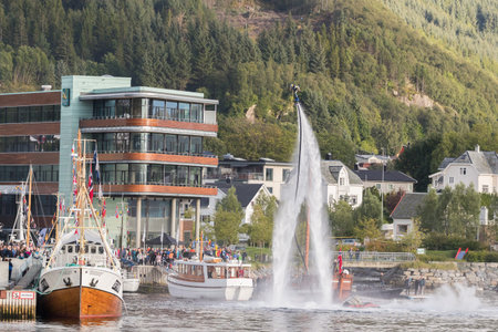ULSTEINVIK, NORWAY - 2018 AUGUST 23. Ulsteinvik wood boat festival with water jet show in the...