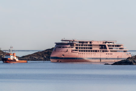 ULSTEINVIK, NORWAY - 2019 APRIL. National Geographic Endurance towing into the yard of Ulsteinvik.のeditorial素材