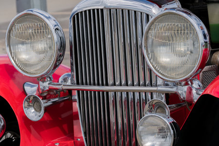 GEIRANGER, NORWAY - 2020 JUNE 21. Front view of old red vintage car.のeditorial素材