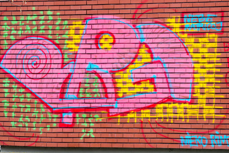 VILNIUS, LITHUANIA - 2020 MARCH 07. Street art on the brick wall.のeditorial素材