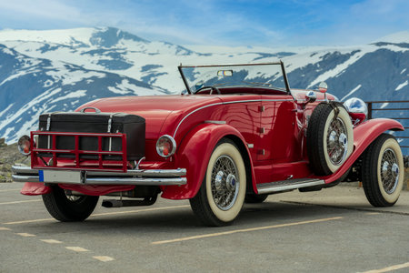GEIRANGER, NORWAY - 2020 JUNE 21. Rear view of old red vintage car.のeditorial素材