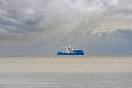HAREID, NORWAY - 2020 MARCH 15. Windfarm vessel Windea Jules Verne in the fjord of Norway.のeditorial素材