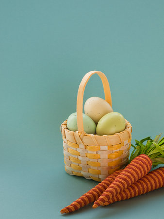 Box and basket with painted easter eggs.の写真素材