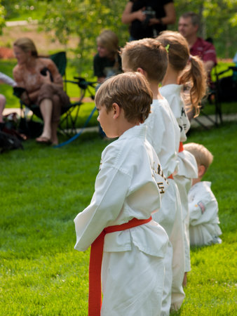 Belt test at J.W. Kim TaeKwonDo School. At the park in Greenwood Village, Colorado. June 2011.のeditorial素材