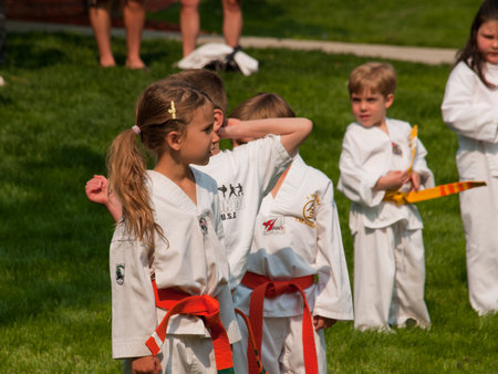 Belt test at J.W. Kim TaeKwonDo School. At the park in Greenwood Village, Colorado. June 2011.のeditorial素材