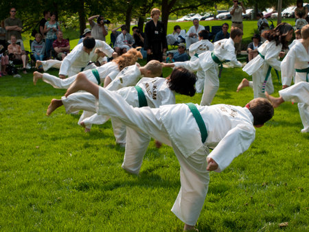 Belt test at J.W. Kim TaeKwonDo School. At the park in Greenwood Village, Colorado. June 2011.のeditorial素材