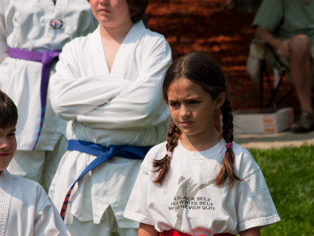 Belt test at J.W. Kim TaeKwonDo School. At the park in Greenwood Village, Colorado. June 2011.のeditorial素材