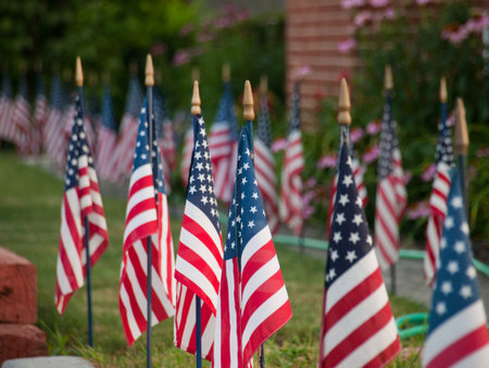 Lawn flags with morning sunshine in downtown Linglestown, Pennsylvania.