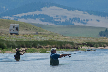 Fishing with dad for pike at the Spinney Reservoir, Colorado.のeditorial素材