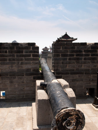 Old artillery on display in Xi'an's city wall, Xian China.のeditorial素材