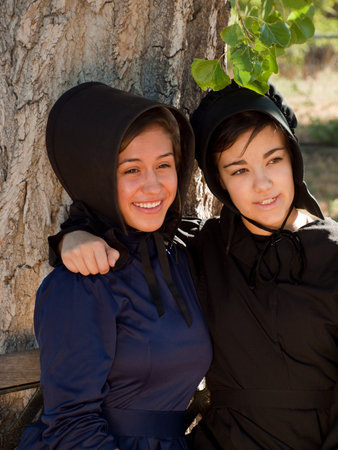 Two amish girls on the bench.のeditorial素材