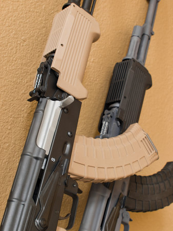 Custom painted AK-47 with a 30 round magazine and a folding stock.のeditorial素材