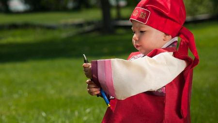 Asian baby, one year old child wearing the traditional Korean cultural ethnic attire, called...
